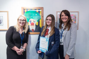 Proud Teachers with winning student at exhibition